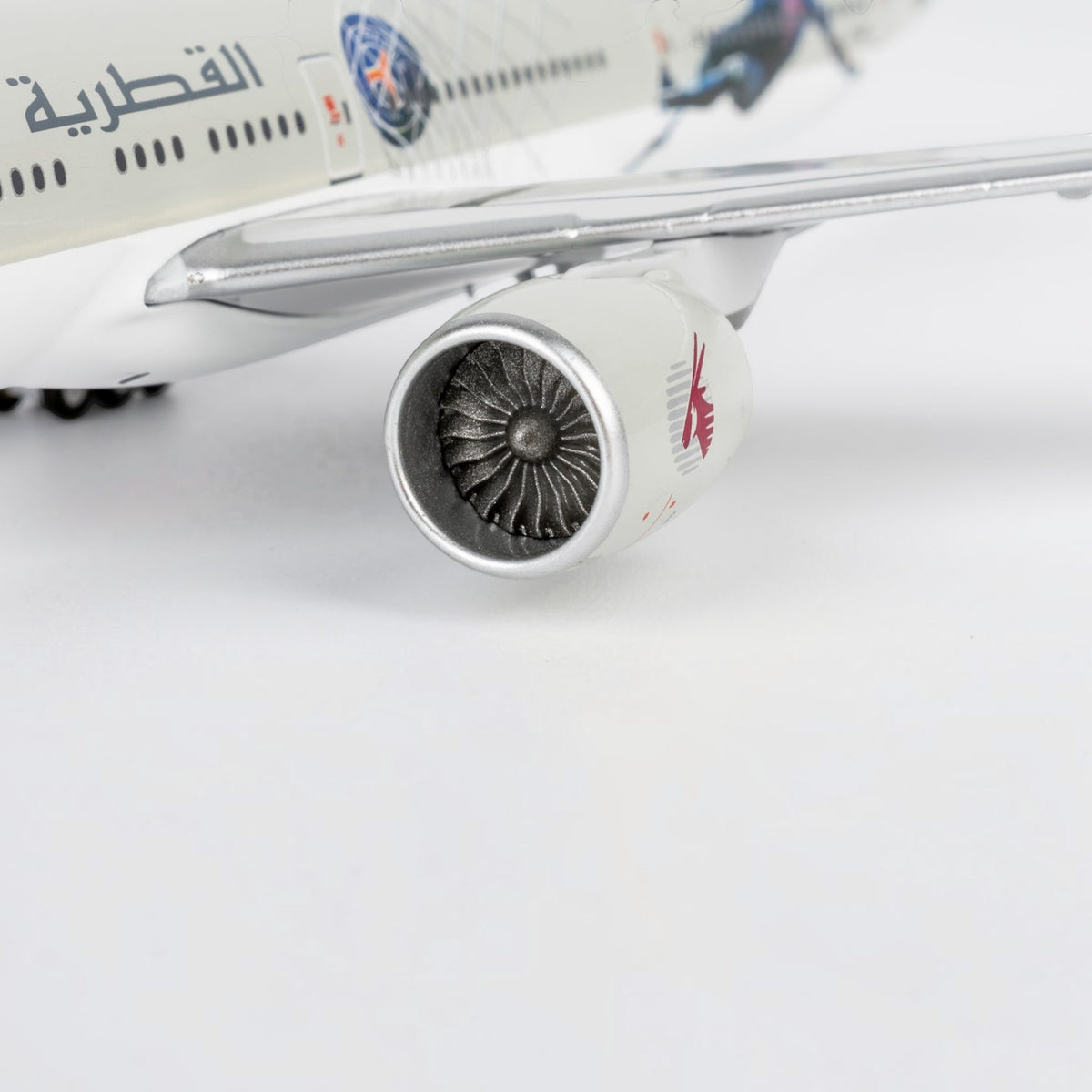 Slice 1:400 scale diecast Boeing 777-300ER model engine detail in Qatar Airways Paris Saint Germain livery