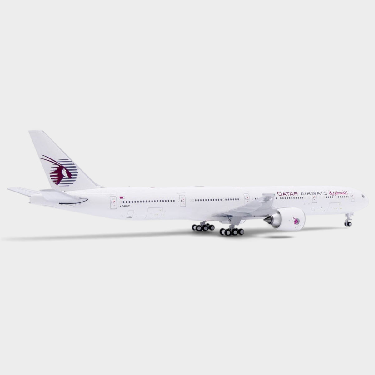 Slice 1:400 scale diecast Boeing 777-300ER model in Qatar Airways all white livery with landing gear and antennas