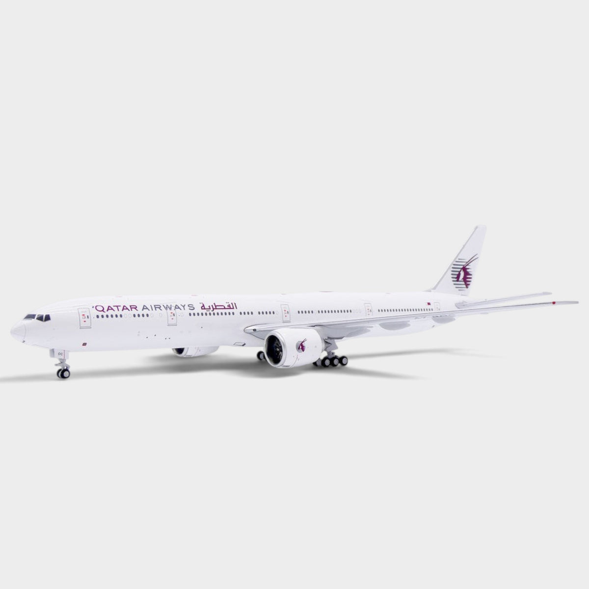 Slice 1:400 scale diecast Boeing 777-300ER model in Qatar Airways all white livery with landing gear and antennas