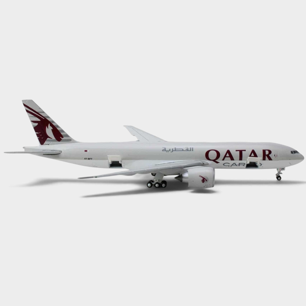 Slice Gemini Jets 1:400 scale diecast Boeing 777-200LRF model in Qatar Airways Cargo livery with landing gear