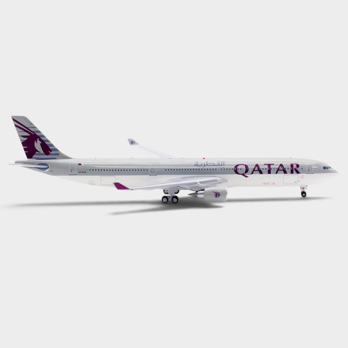 Slice 1:400 scale diecast metal model of a Qatar Airways Airbus A330-300 with landing gear and detailed livery