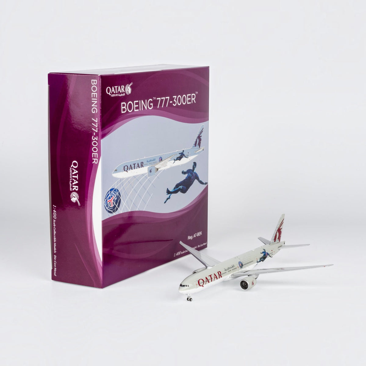 Slice 1:400 scale diecast Boeing 777-300ER Qatar Airways Paris Saint Germain model plane with its purple display box