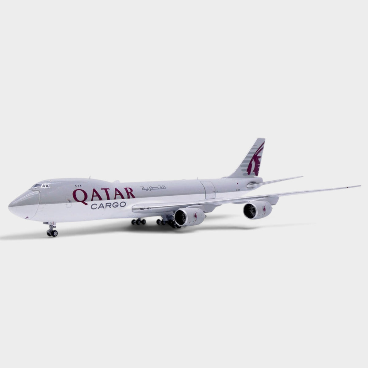 Slice 1:400 scale diecast model of a Qatar Airways Cargo Boeing 747-8F freighter with detailed landing gear