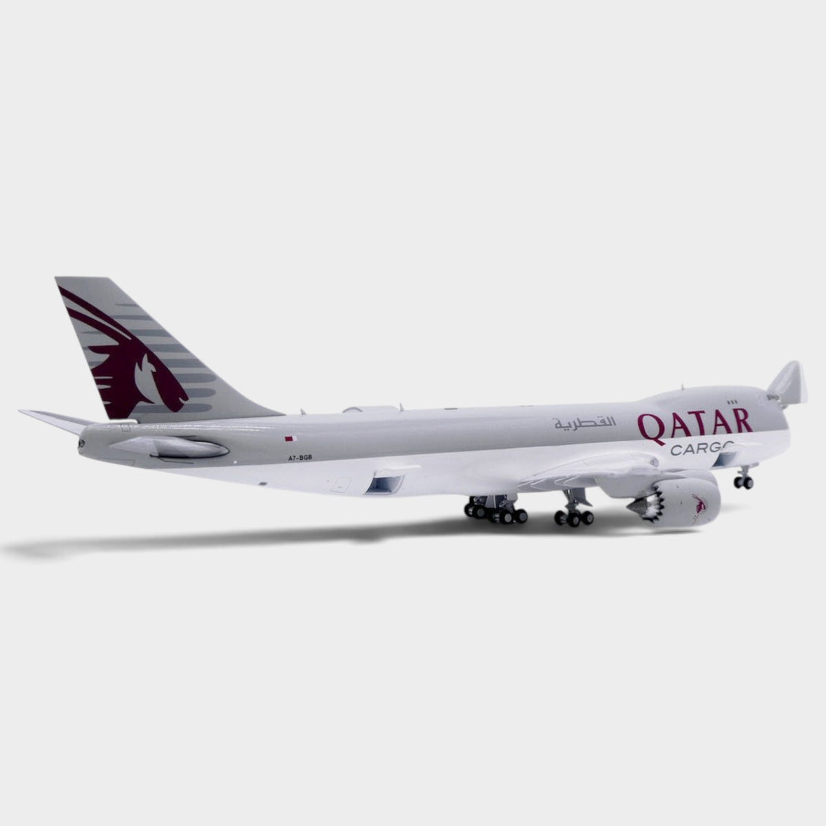 Slice 1:400 scale diecast model of a Qatar Airways Cargo Boeing 747-8F freighter with detailed landing gear
