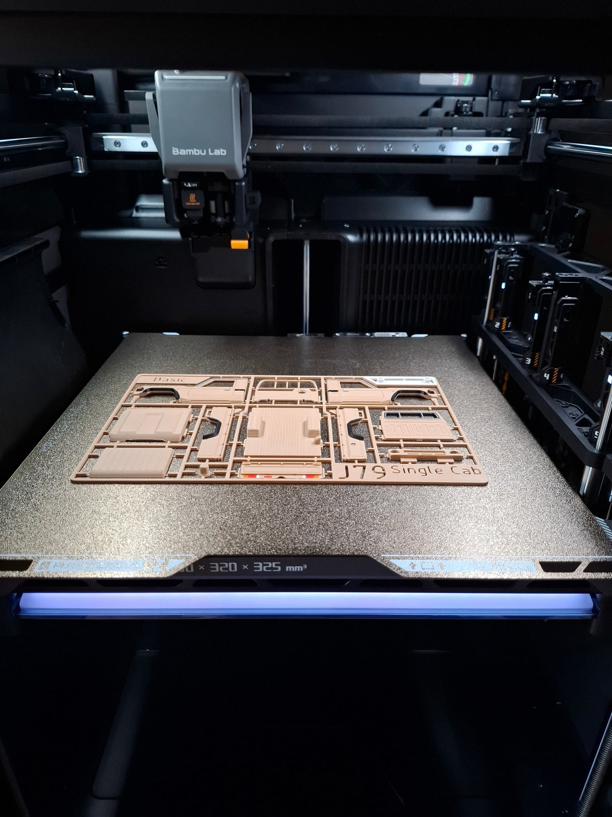 Slice Army Edition Toyota Pickup single cab model kit on 3D printer bed, tan plastic parts