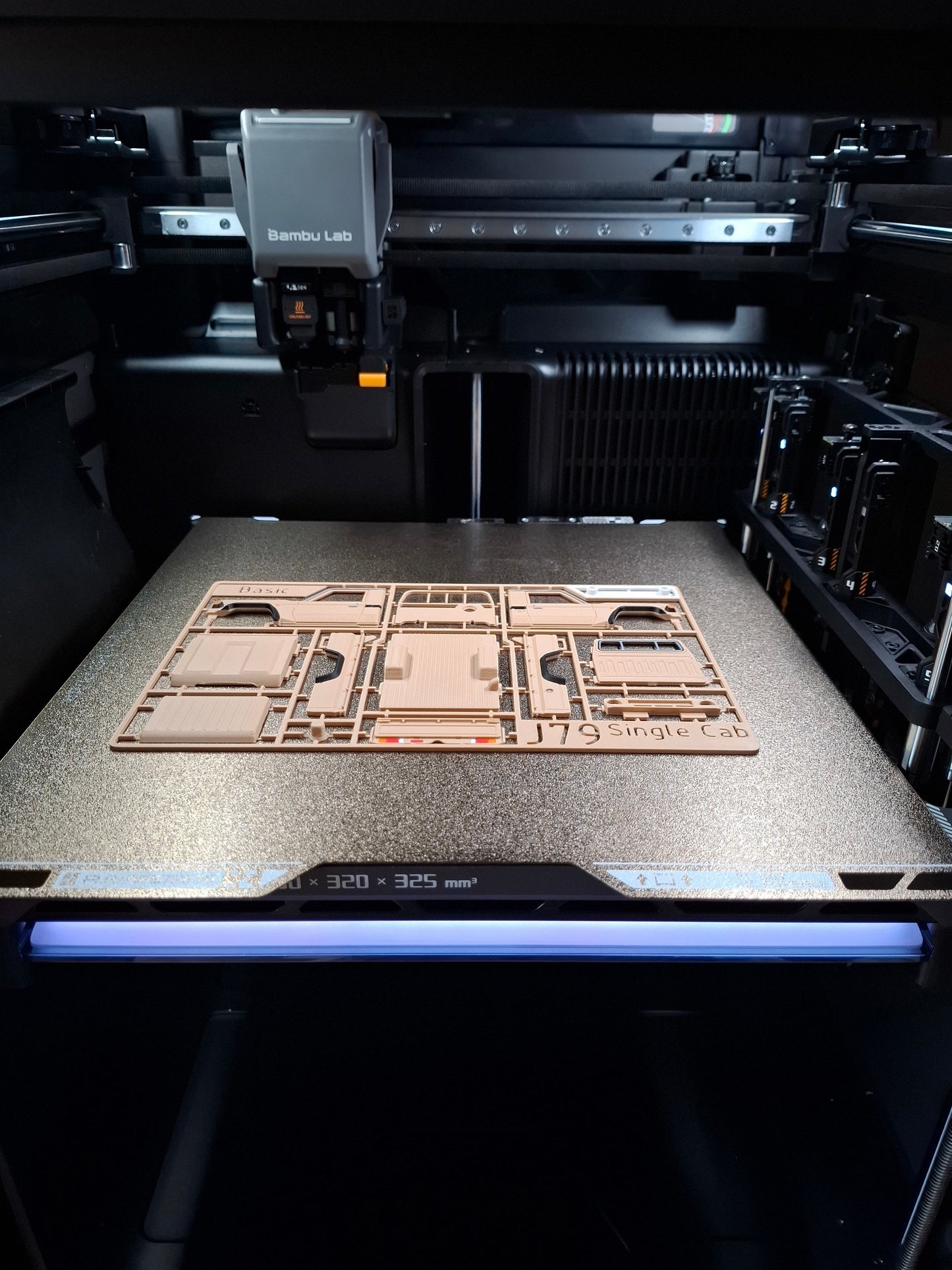 Slice Army Edition Toyota Pickup single cab model kit on 3D printer bed, tan plastic parts