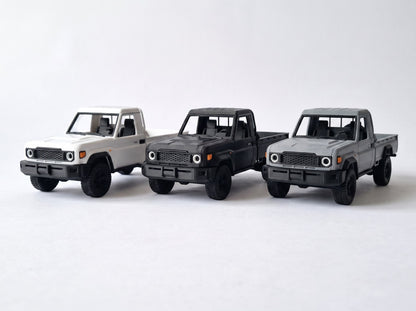 Slice Toyota Pickup Single Cab Army Edition model truck in army green, black, and grey. Highly detailed 3D-printed construction.